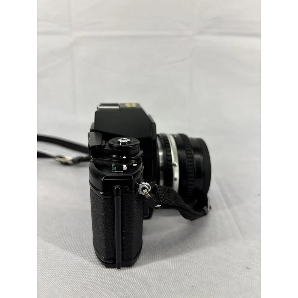 Nikon EM 35mm Film SLR Camera 50mm f/1.8 Lens Black Compact Vintage Japan